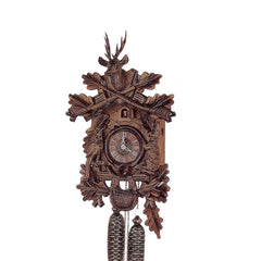 Horloge à coucou mécanique avec de jolis animaux et des décorations de feuilles