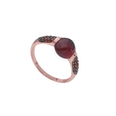 Bague en or rose 18 carats - 750 avec grenats sertis