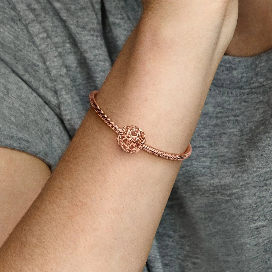 Pandora All Over-Herzen Charm: Rosévergoldet, 11 mm Breite