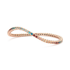 Bracelet tennis élastique à facettes avec topaze colorée en or rose 750/18 carats